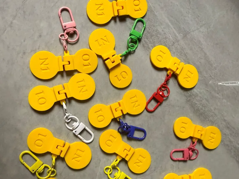 SG shopping trolley token keychain