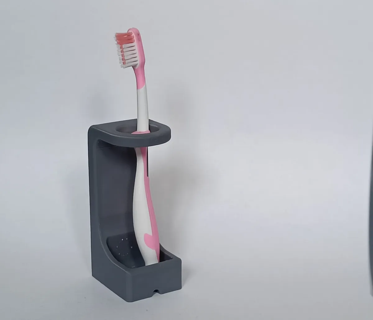 Porte-brosse à dents avec réservoir