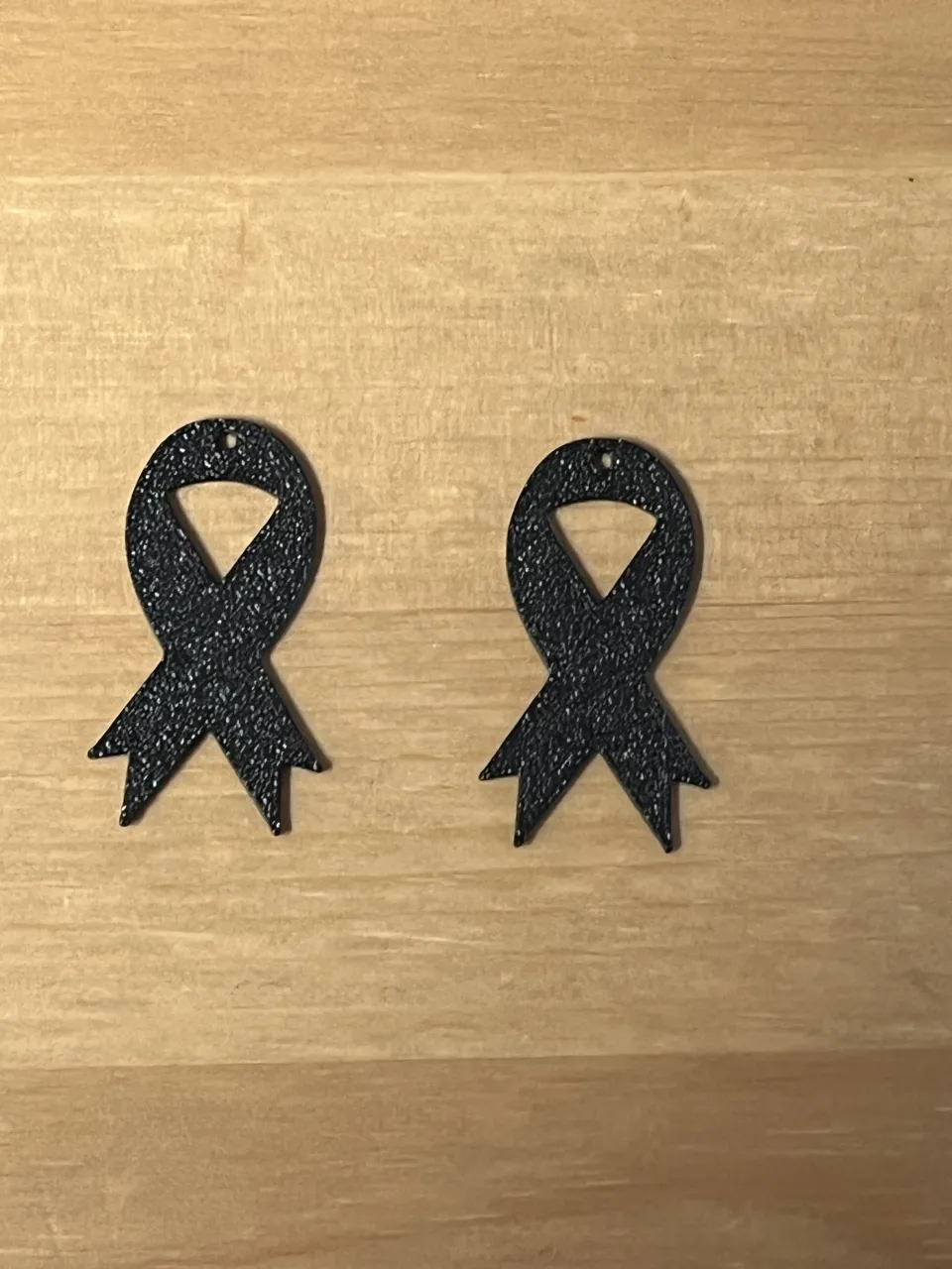 cancer bow earrings view 2