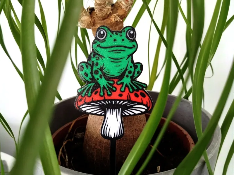 Blumenstecker Frosch auf Pilz