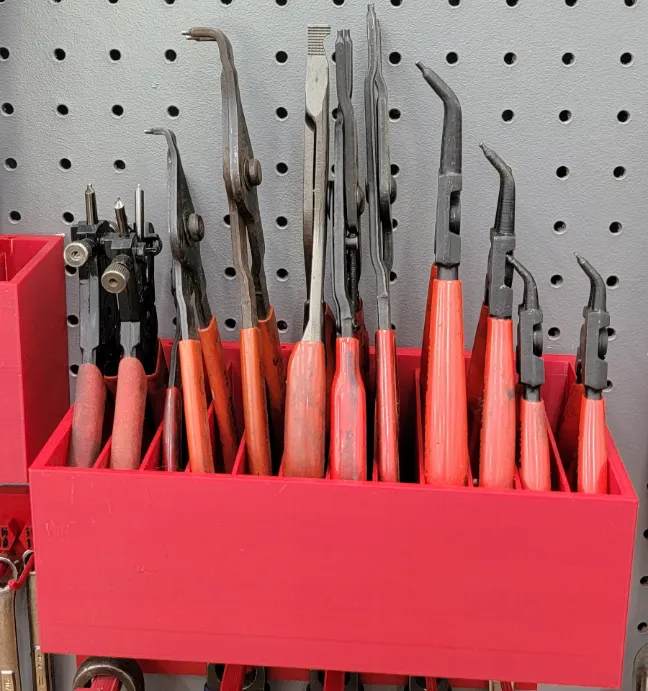 Snap ring plier holder for peg board