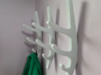 Wall hooks with a hidden dovetail mount