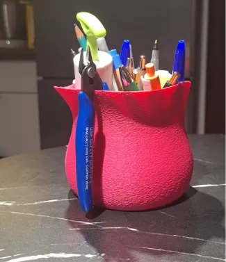 A small vase/container for various items,irregular
