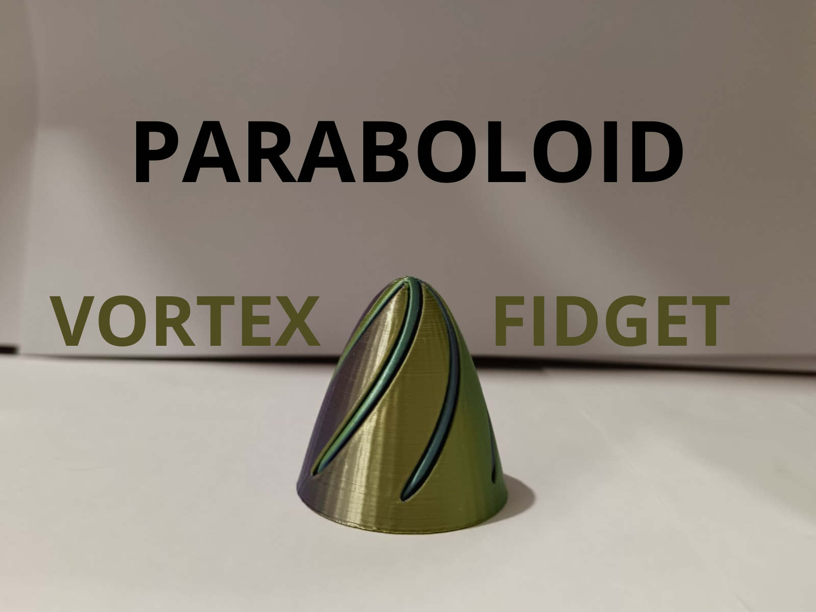 Paraboloid vortex fidget