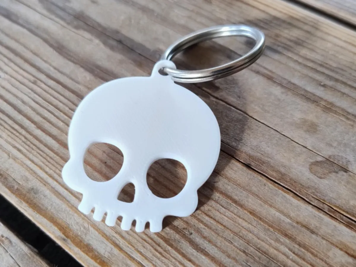 Halloween skeleton skull keychain - Free 3D Print Model - MakerWorld