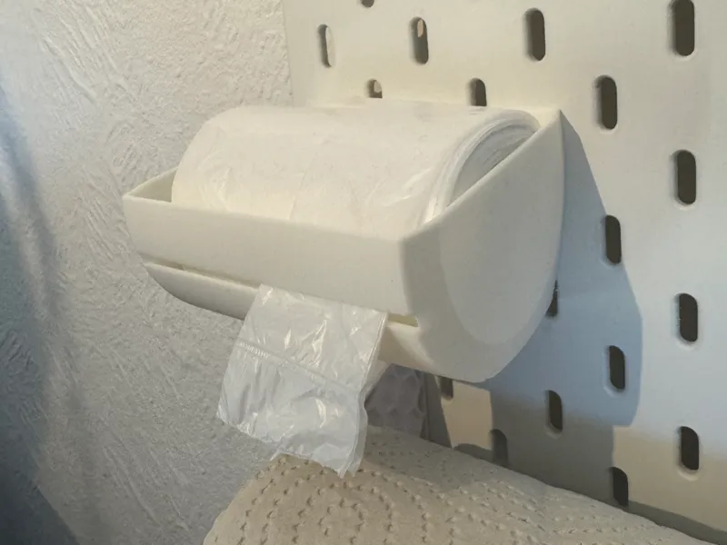 Skadis trash bag holder for trash bag roll