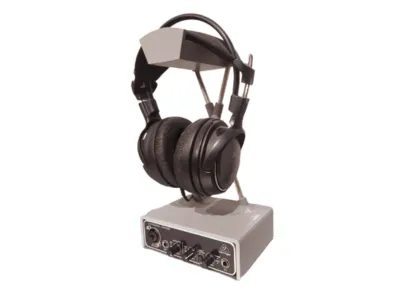 Headphone stand with speaker switch option