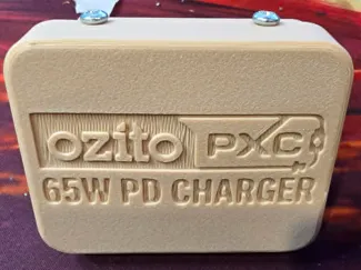 Compact Ozito PXC 20V to 65W USB-PD Adapter