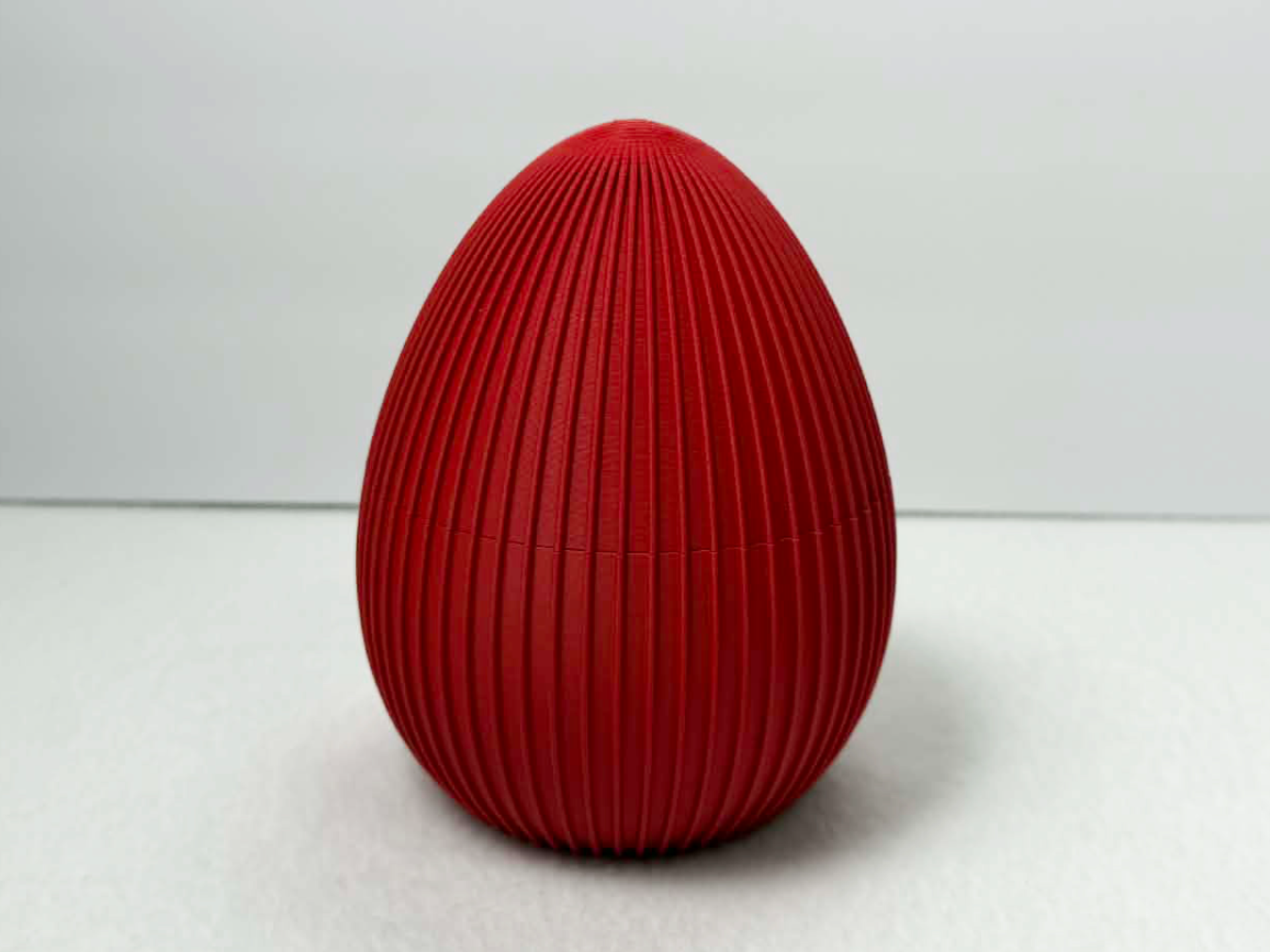 Miniatura 1 do modelo 3D Ribbed Egg Container