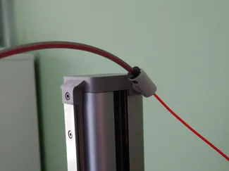 PTFE tube relocator
