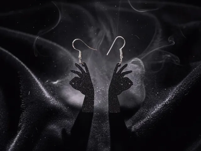 Illusionist eyes hand earrings