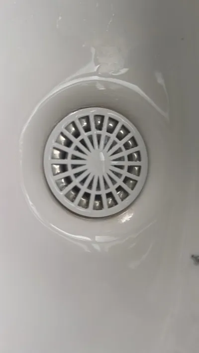 Bathroom sink strainer