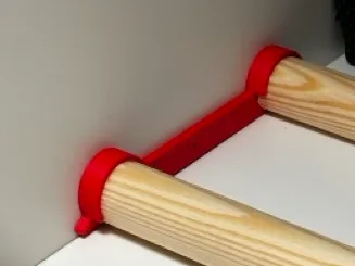 Simple spool holder bracket for cupboard