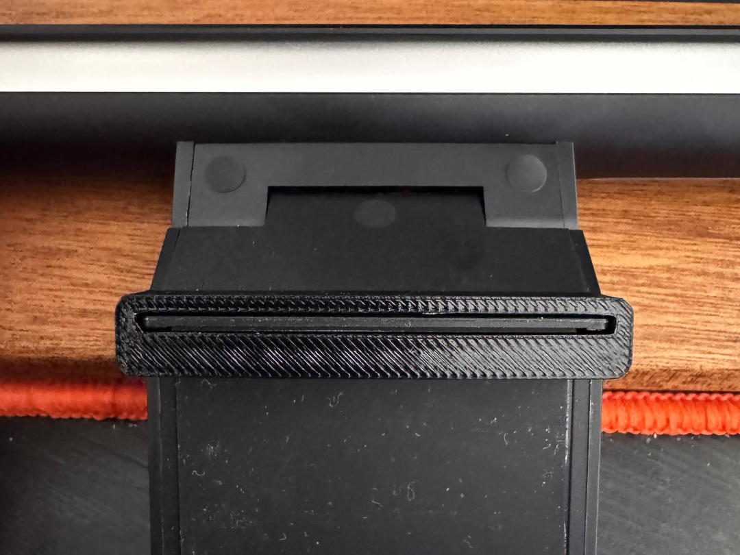 Customizable spacer for light bars, webcams, etc.