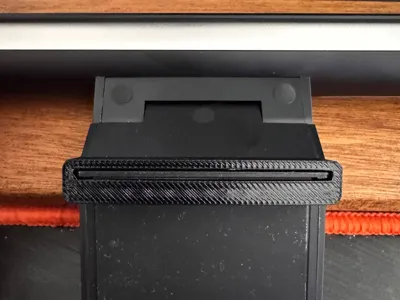 Customizable spacer for light bars, webcams, etc.