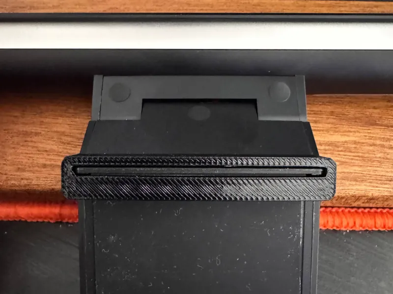 Customizable spacer for light bars, webcams, etc.