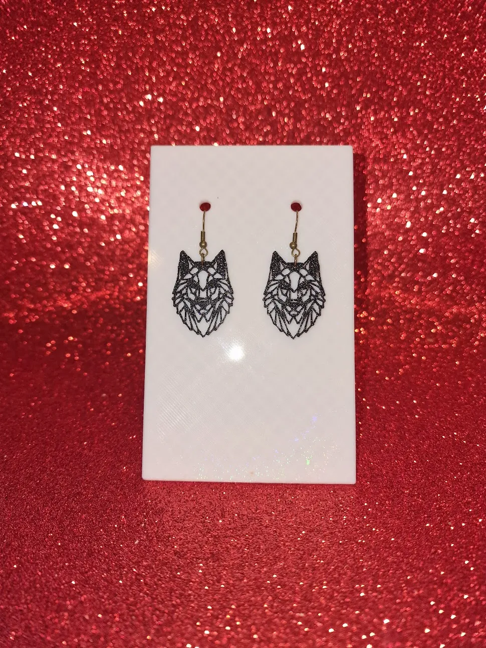 Abstract wolf earrings view 2