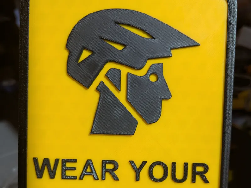 Helmet safety sign 