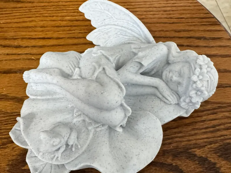 sleeping fairy garden statue