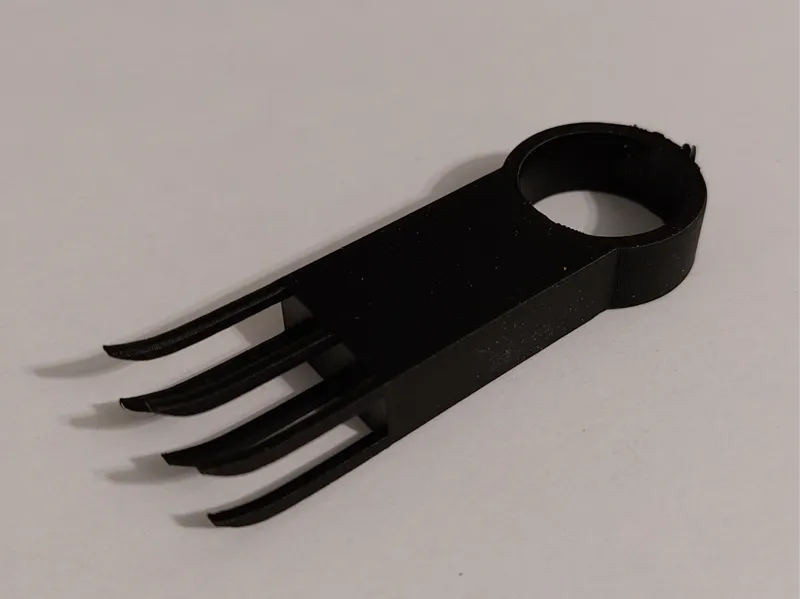 Poop chute scraper