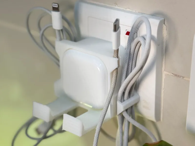 Iphone wall / outlet stand 