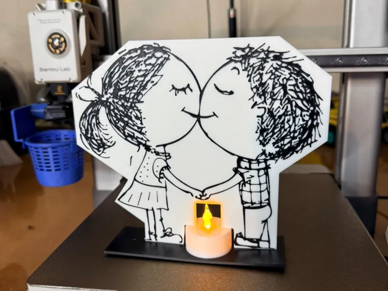 Coppia che si Bacia con Luce Decorativa