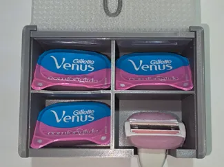 Porta Rasuradora de Baño para Mujer