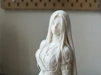 Figurine de religieuse assise — photo 1
