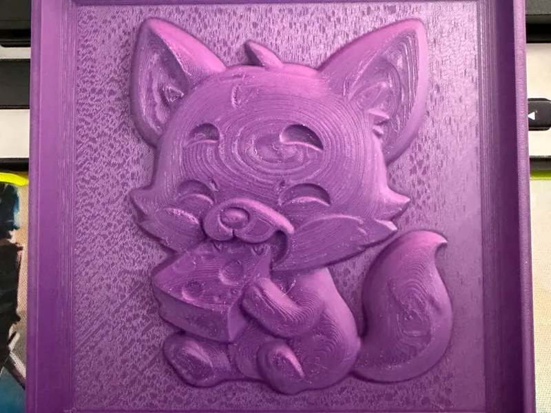 Fox eating cheese embossed relief