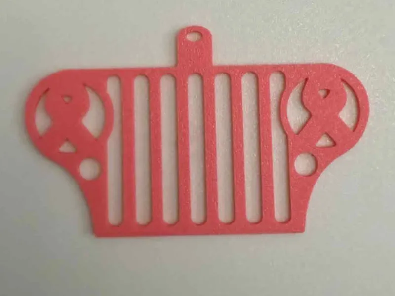 Jeep grill w/ cancer awareness ribbons