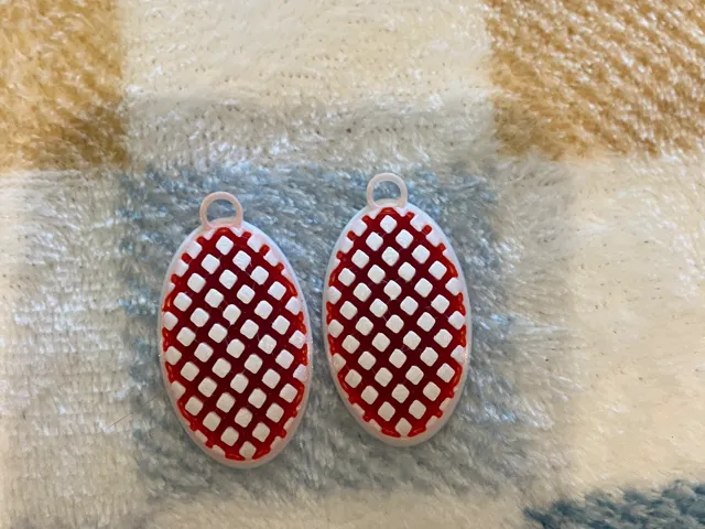 Oval rising earrings