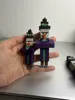 The larger one in the picture does not come with potion bottles, it has two heads, one with a keyhole, and one without a keyhole