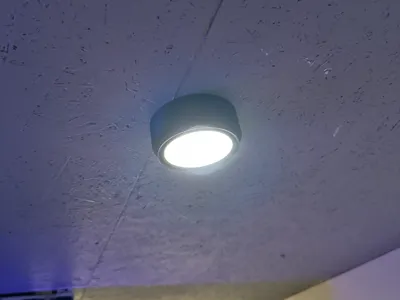 Ceiling mount for battery spotlight