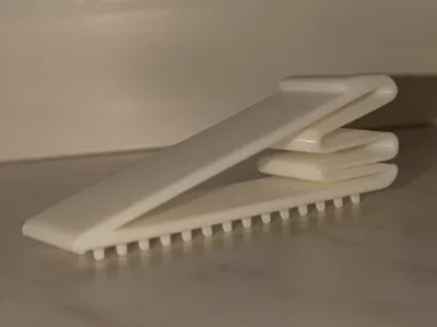 springy doorstop with spikes (for carpets)