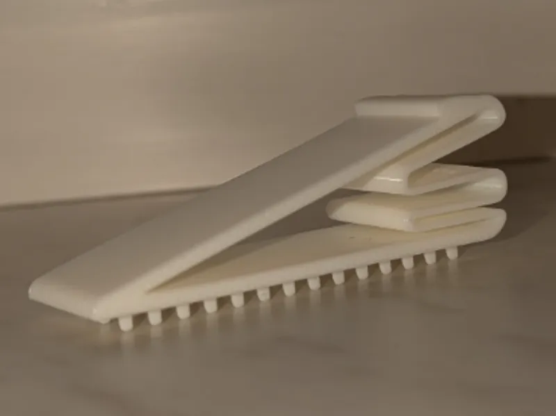 springy doorstop with spikes (for carpets)