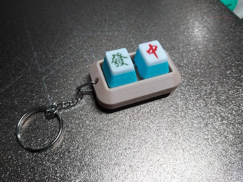 Dual keycap clicker fidget