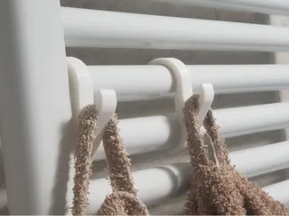 Radiator towel hanger