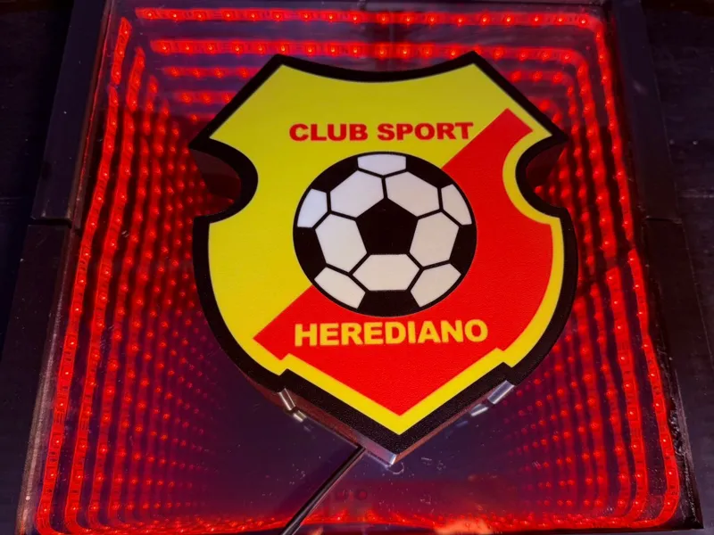 Lightbox featuring the Heredia team crest