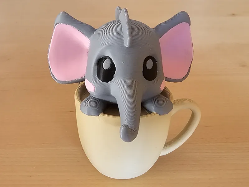 Cute Baby Elephant in a Cup