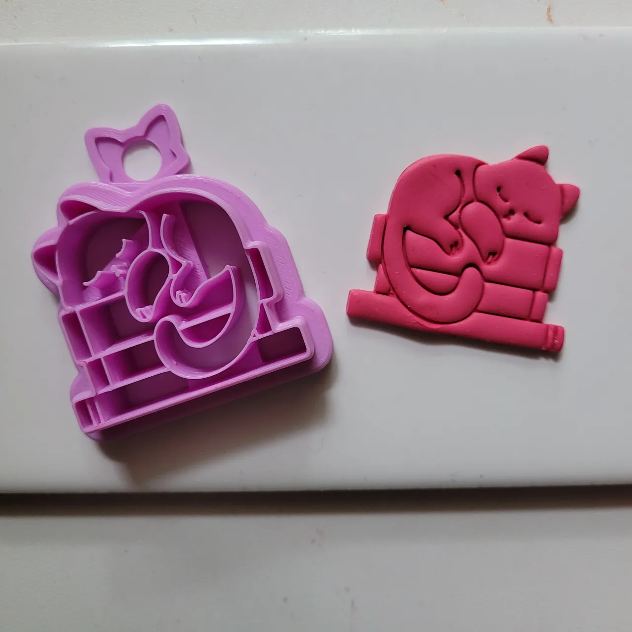 Cat Sleeping On Books Polymer Clay Earring Cutter view 2