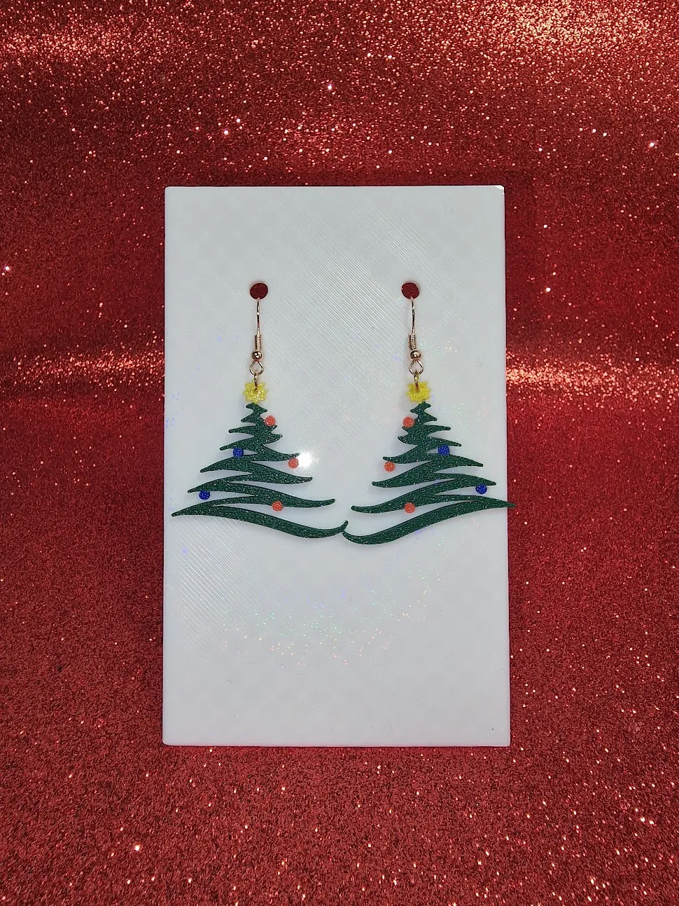 Decorated Christmas tree earrings view 2