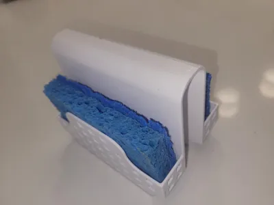 Sponge holder for double sink