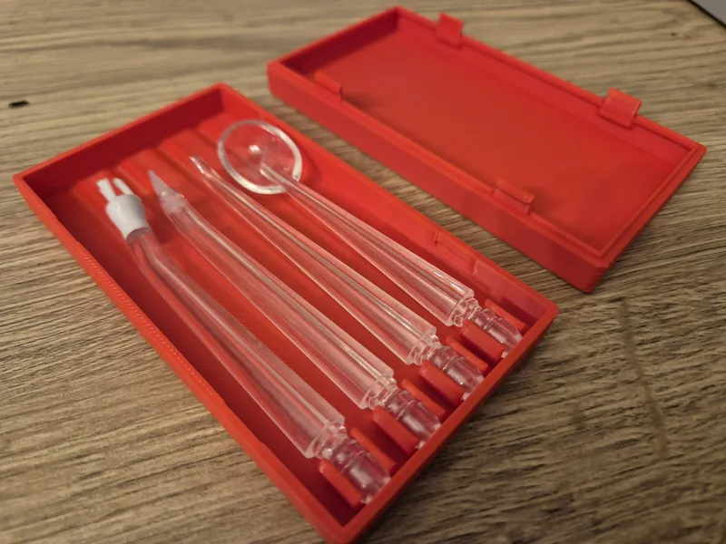 Snap on box for oral irrigator accessories