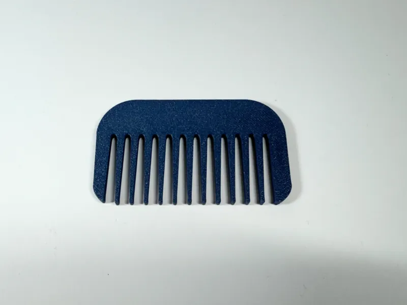Comb with wide teeth