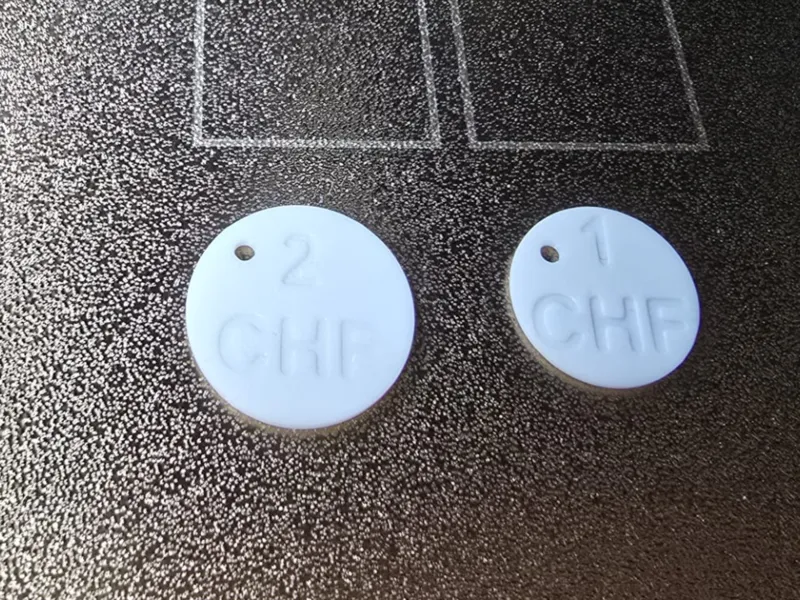 Disco simile a  1 CHF e 2CHF per carrello spesa