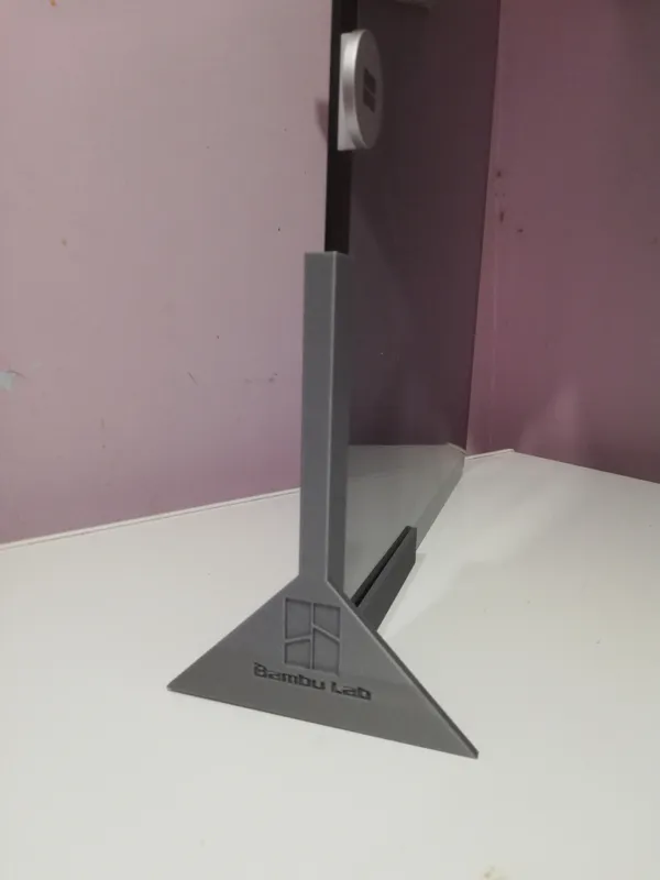 Support pour capot vitré d'imprimante