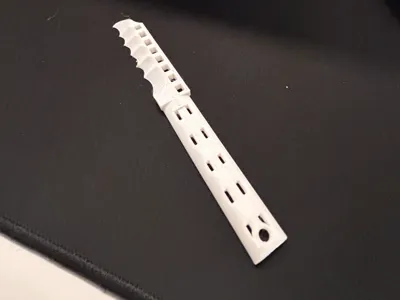 small sharp plastic knife
