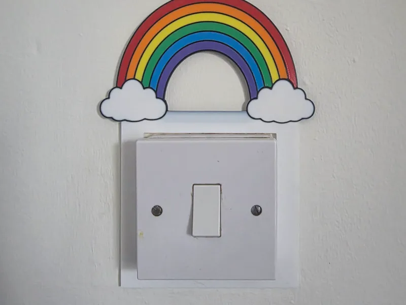 Rainbow light switch surround