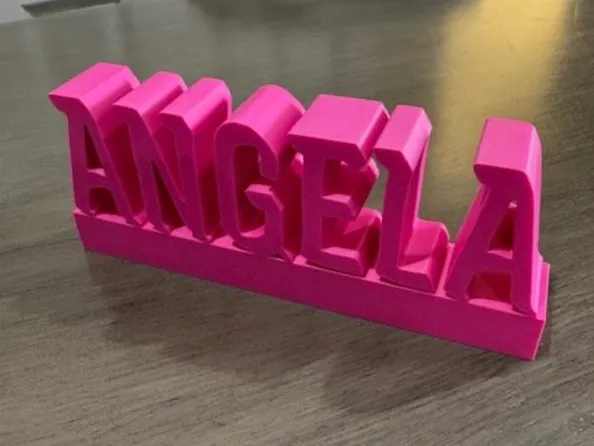 Angela Desk name plate.