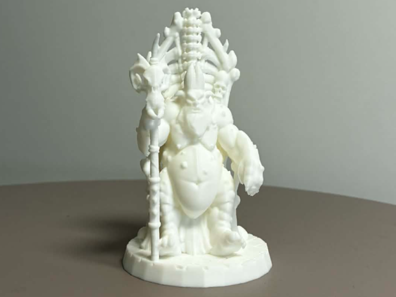 Fat Goblin King sitting on a throne DND tabletop